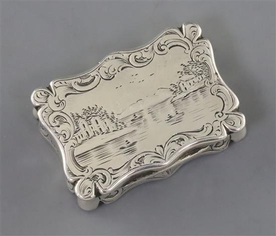 A Victorian silver shaped rectangular vinaigrette, by Edward Smith, the lid engraved with boats and riverscape,